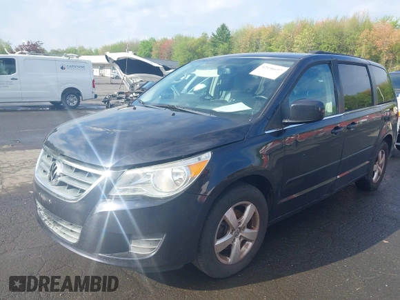 2011 Volkswagen Routan SE z VIN 2V4RW3DG3BR717246, wystawiony jako IAAI lot #42196697 z przebiegiem 155 375 mil mil oraz . Historia ofert i sprzedaży dostępna na DreamBid. Obrazek 17.