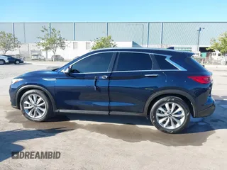 2021 Infiniti QX50 Luxe with VIN 3PCAJ5BB1MF119650, listed as a IAAI auction lot 41856455 with 64,674 mi miles and . Bid and sale history available at DreamBid. Image 14.