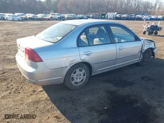 2002 Honda Civic LX with VIN 2HGES16602H581131, listed as a IAAI auction lot 40993388 with 116,663 mi miles. Bid and sale history available at carsss.com. Image 4.