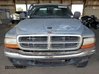 1999 Dodge Dakota SLT with VIN 1B7GG22Y0XS259031, listed as a Copart auction lot 87972505 with 153,354 mi miles and Salvage Title. Bid and sale history available at DreamBid. Image 5.