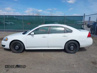 2015 Chevrolet Impala Limited Police Police with VIN 2G1WD5E35F1165983, listed as a IAAI auction lot 41969158 with 137,779 mi miles. Bid and sale history available at carsss.com. Image 13.