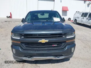 2017 Chevrolet Silverado 1500 LT with VIN 1GCVKREC9HZ180710, listed as a IAAI auction lot 40204758 with 255,247 mi miles and . Bid and sale history available at DreamBid. Image 12.