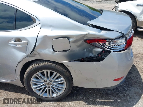 2013 Lexus ES 250 with VIN JTHBK1GG6D2051667, listed as a IAAI auction lot 41992142 with 103,876 mi miles and . Bid and sale history available at DreamBid. Image 6.