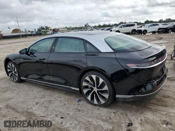 2022 Lucid Air Grand Touring z VIN 50EA1GBA6NA001280, wystawiony jako Copart lot #74004994 z przebiegiem Nie podano mil oraz Szkody całkowita. Historia ofert i sprzedaży dostępna na DreamBid. Obrazek 2.