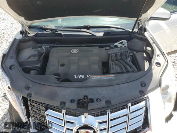 2016 Cadillac SRX Luxury Collection z VIN 3GYFNBE34GS505188, wystawiony jako Copart lot #56690805 z przebiegiem 121 935 mil mil oraz Czysty tytuł • Clean title. Historia ofert i sprzedaży dostępna na DreamBid. Obrazek 12.
