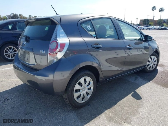 2014 Toyota Prius c One with VIN JTDKDTB37E1571685, listed as a IAAI auction lot 41967732 with 1 mi miles. Bid and sale history available at carsss.com. Image 4.