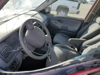 2004 Chevrolet Tracker with VIN 2CNBJ134846911647, listed as a Copart auction lot 77128924 with Not provided miles and Salvage title. Bid and sale history available at DreamBid. Image 7.