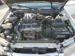 2001 Toyota Camry LE z VIN JT2BF22K010297055, wystawiony jako Copart lot #59510645 z przebiegiem 265 428 mil mil oraz Szkoda całkowita • Salvage title. Historia ofert i sprzedaży dostępna na DreamBid. Obrazek 11.