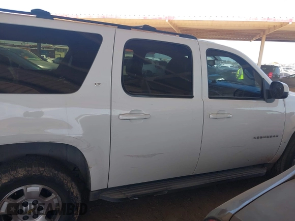 2012 Chevrolet Suburban LT with VIN 1GNSKJE70CR295137, listed as a IAAI auction lot 42112072 with 291,912 mi miles and . Bid and sale history available at DreamBid. Image 13.