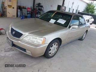 1999 Acura RL with VIN JH4KA9666XC008326, listed as a IAAI auction lot 42724647 with Not provided miles and . Bid and sale history available at DreamBid. Image 2.
