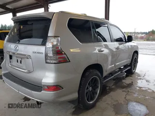 2014 Lexus GX 460 with VIN JTJBM7FX8E5066197, listed as a IAAI auction lot 41969413 with 134,494 mi miles and . Bid and sale history available at DreamBid. Image 4.