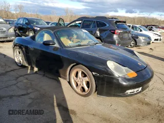 2000 Porsche Boxster z VIN WP0CA2980YU626358, wystawiony jako Copart lot #36977344 z przebiegiem 117 561 mil mil oraz Szkoda całkowita • Salvage title. Historia ofert i sprzedaży dostępna na DreamBid. Obrazek 4.