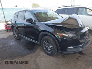 2020 Mazda CX-5 Touring with VIN JM3KFACM0L0804998, listed as a IAAI auction lot 41850998 with 44,519 mi miles. Bid and sale history available at carsss.com. Image 1.