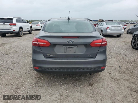 2018 Ford Focus SE z VIN 1FADP3F20JL223152, wystawiony jako Copart lot #51457695 z przebiegiem 118 240 mil mil oraz Czysty tytuł • Clean title. Historia ofert i sprzedaży dostępna na DreamBid. Obrazek 6.