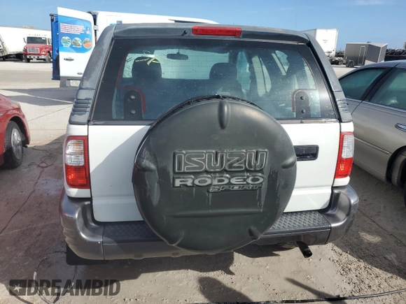 2001 Isuzu Rodeo z VIN 4S2CK57W614340766, wystawiony jako Copart lot #73891524 z przebiegiem 124 446 mil mil oraz Nie do naprawy. Historia ofert i sprzedaży dostępna na DreamBid. Obrazek 6.