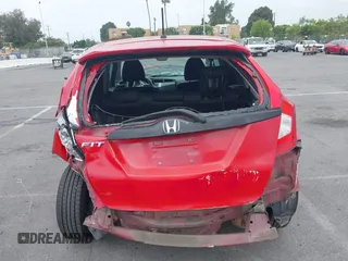 2015 Honda Fit LX with VIN 3HGGK5H5XFM775385, listed as a IAAI auction lot 42555319 with 81,615 mi miles and . Bid and sale history available at DreamBid. Image 17.