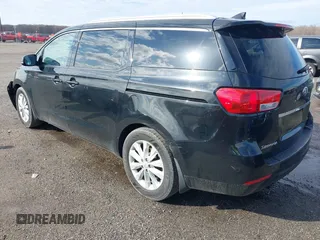 2017 Kia Sedona EX with VIN KNDMC5C18H6260441, listed as a IAAI auction lot 41797159 with 77,309 mi miles. Bid and sale history available at carsss.com. Image 3.