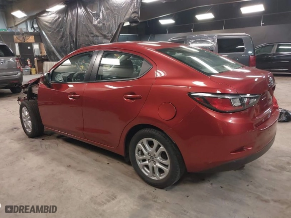 2018 Toyota Yaris iA with VIN 3MYDLBYV0JY315135, listed as a IAAI auction lot 41284774 with 64,561 mi miles. Bid and sale history available at carsss.com. Image 3.