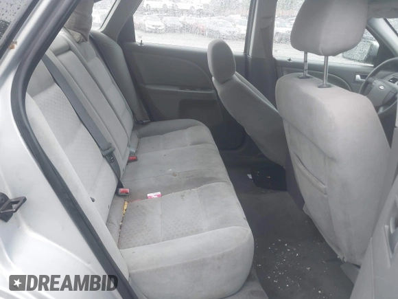 2005 Ford Five Hundred SE z VIN 1FAFP23115G106256, wystawiony jako IAAI lot #42263958 z przebiegiem Nie podano mil oraz . Historia ofert i sprzedaży dostępna na DreamBid. Obrazek 8.
