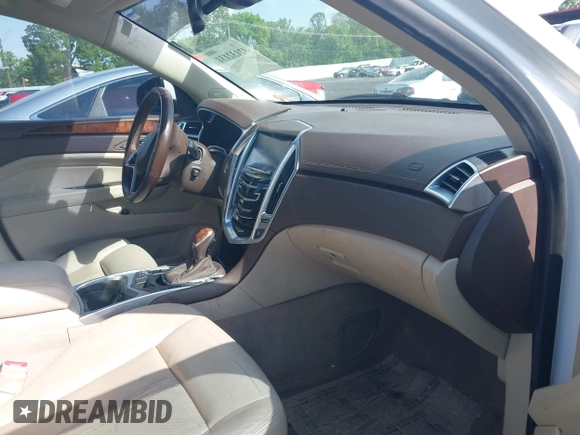 2015 Cadillac SRX Luxury Collection with VIN 3GYFNBE32FS542710, listed as a IAAI auction lot 42132131 with 246,226 mi miles. Bid and sale history available at carsss.com. Image 5.