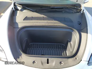 2022 Tesla Model Y Performance с VIN 7SAYGDEF4NF381656, выставлен на аукционе Copart как лот 48758954 с пробегом 18 335 миль миль и Списание • Salvage title. История ставок и продаж доступна на DreamBid. Изображение 11.