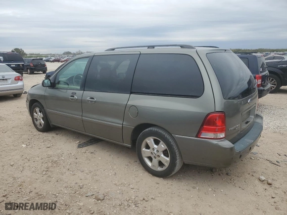 2005 Ford Freestar Wagon SEL with VIN 2FMZA52205BA50351, listed as a Copart auction lot 83223294 with 2,233,782 mi miles and Salvage Title. Bid and sale history available at carsss.com. Image 2.