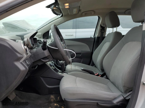 2014 Chevrolet Sonic LS with VIN 1G1JA6SH9E4164380, listed as a Copart auction lot 41633345 with 56,862 mi miles and Salvage Title. Bid and sale history available at carsss.com. Image 7.