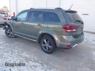 2017 Dodge Journey Crossroad Plus with VIN 3C4PDDGG5HT517581, listed as a IAAI auction lot 41225446 with 136,193 mi miles and . Bid and sale history available at DreamBid. Image 3.