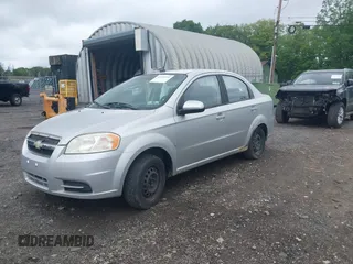 2009 Chevrolet Aveo 1LT z VIN KL1TD56E39B643484, wystawiony jako IAAI lot #42359233 z przebiegiem 88 974 mil mil oraz . Historia ofert i sprzedaży dostępna na DreamBid. Obrazek 2.