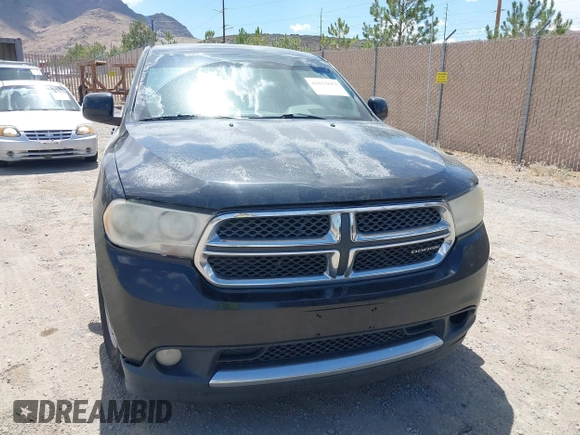 2012 Dodge Durango SXT with VIN 1C4RDJAG0CC206726, listed as a IAAI auction lot 42653653 with 243,337 mi miles and . Bid and sale history available at DreamBid. Image 12.