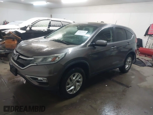 2015 Honda CR-V EX with VIN 2HKRM4H56FH662101, listed as a IAAI auction lot 41623155 with 173,554 mi miles and . Bid and sale history available at DreamBid. Image 2.