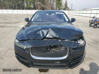 2017 Jaguar XE 25t with VIN SAJAR4BGXHA965404, listed as a Copart auction lot 49105855 with 76,990 mi miles and Salvage Title. Bid and sale history available at carsss.com. Image 5.