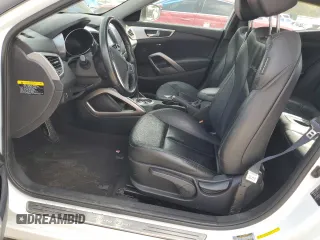 2014 Hyundai Veloster with VIN KMHTC6AD5EU213773, listed as a Copart auction lot 74619554 with 98,315 mi miles and Salvage Title. Bid and sale history available at carsss.com. Image 7.