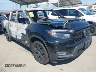 2024 Honda Ridgeline Black Edition with VIN 5FPYK3F89RB015601, listed as a IAAI auction lot 41880308 with Not provided miles and . Bid and sale history available at DreamBid. Image 1.