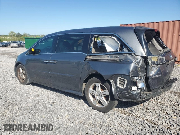 2012 Honda Odyssey Touring with VIN 5FNRL5H93CB028282, listed as a Copart auction lot 52322015 with 206,582 mi miles and Salvage Title. Bid and sale history available at carsss.com. Image 2.