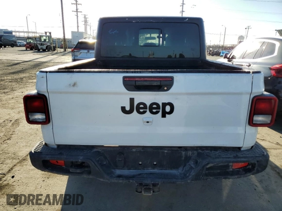 2023 Jeep Gladiator Sport S with VIN 1C6HJTAG4PL528847, listed as a Copart auction lot 64470375 with 36,177 mi miles and Salvage title. Bid and sale history available at DreamBid. Image 6.