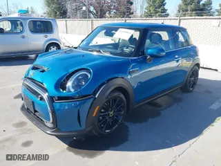 2024 MINI Hardtop 2 Door Cooper SE with VIN WMW13DJ01R2V90046, listed as a IAAI auction lot 41448064 with 3,963 mi miles. Bid and sale history available at carsss.com. Image 2.
