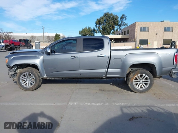 2018 GMC Canyon 4WD SLT with VIN 1GTP6DE11J1302382, listed as a IAAI auction lot 41318784 with 114,981 mi miles. Bid and sale history available at carsss.com. Image 14.