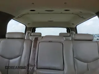 2004 Chevrolet Suburban LT z VIN 1GNEC16Z44R302179, wystawiony jako Copart lot #57956605 z przebiegiem 291 567 mil mil oraz Szkoda całkowita • Salvage title. Historia ofert i sprzedaży dostępna na DreamBid. Obrazek 10.