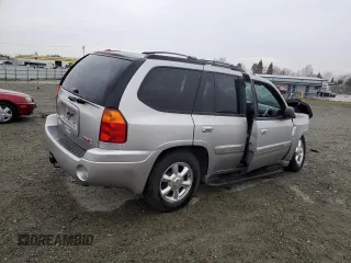 2004 GMC Envoy SLE with VIN 1GKDS13S142358446, listed as a Copart auction lot 43383935 with 154,358 mi miles and Salvage Title. Bid and sale history available at carsss.com. Image 3.
