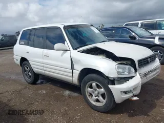 1999 Toyota RAV4 with VIN JT3GP10V7X7057281, listed as a IAAI auction lot 42110228 with 301,749 mi miles and . Bid and sale history available at DreamBid. Image 1.