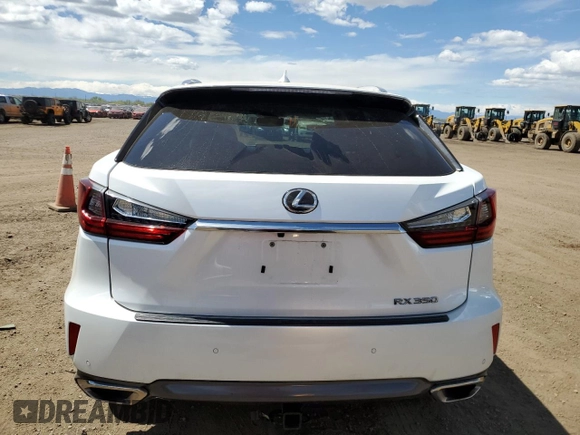 2016 Lexus RX 350 z VIN 2T2BZMCA6GC008254, wystawiony jako Copart lot #54799135 z przebiegiem 109 645 mil mil oraz Szkoda całkowita • Salvage title. Historia ofert i sprzedaży dostępna na DreamBid. Obrazek 6.