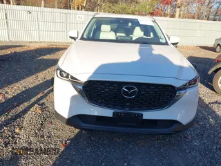 2023 Mazda CX-5 2.5 S Premium Plus Package with VIN JM3KFBEM2P0244281, listed as a IAAI auction lot 40820295 with 10,886 mi miles. Bid and sale history available at carsss.com. Image 12.