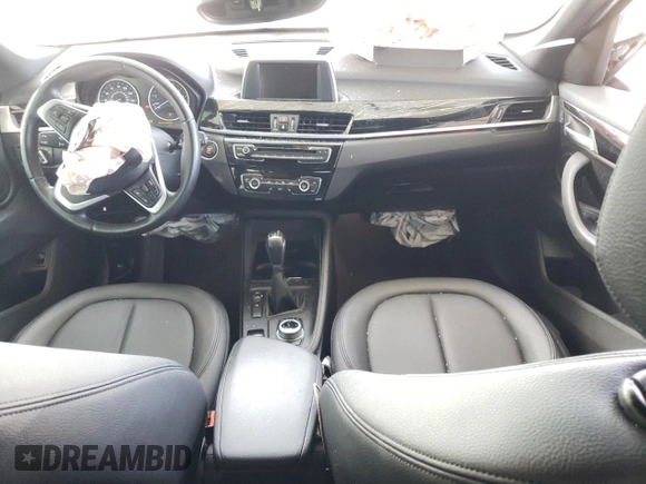 2017 BMW X1 sDrive28i with VIN WBXHU7C34HP924730, listed as a Copart auction lot 52245005 with 0 mi miles and Salvage Title. Bid and sale history available at carsss.com. Image 8.