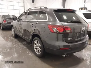 2015 Mazda CX-9 Sport with VIN JM3TB2BA1F0453620, listed as a IAAI auction lot 41330887 with 119,219 mi miles and . Bid and sale history available at carsss.com. Image 3.