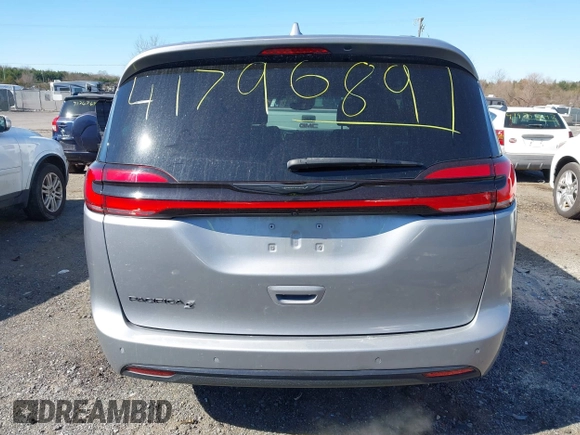2021 Chrysler Pacifica Touring z VIN 2C4RC1FG8MR565455, wystawiony jako IAAI lot #41796891 z przebiegiem 105 645 mil mil oraz . Historia ofert i sprzedaży dostępna na DreamBid. Obrazek 16.