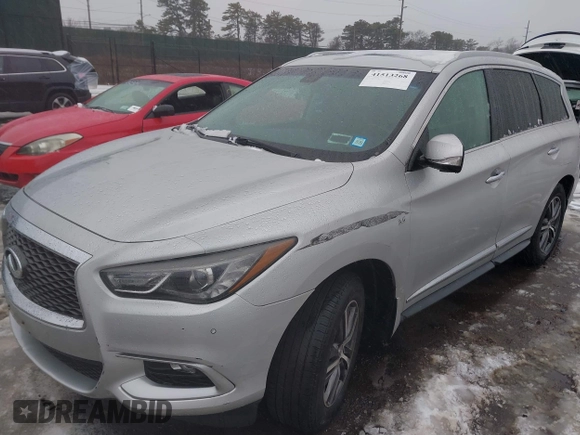 2016 Infiniti QX60 with VIN 5N1AL0MMXGC505959, listed as a IAAI auction lot 41513268 with 130,142 mi miles and . Bid and sale history available at DreamBid. Image 6.