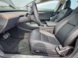 2023 Tesla Model 3 with VIN 5YJ3E1EA1PF468627, listed as a Copart auction lot 57285575 with 5,952 mi miles and Salvage title. Bid and sale history available at DreamBid. Image 7.