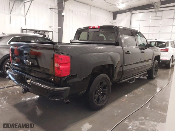 2015 Chevrolet Silverado 1500 LTZ with VIN 3GCUKSEJ9FG448699, listed as a IAAI auction lot 41372615 with 156,010 mi miles. Bid and sale history available at carsss.com. Image 4.