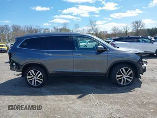 2016 Honda Pilot Elite with VIN 5FNYF6H06GB058392, listed as a IAAI auction lot 41983804 with 103,304 mi miles. Bid and sale history available at carsss.com. Image 14.